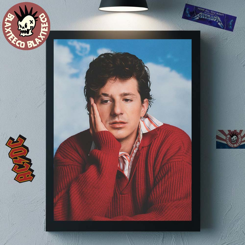 Framed photo of a person in a red sweater with blurred face, surrounded by music-themed stickers on the wall
