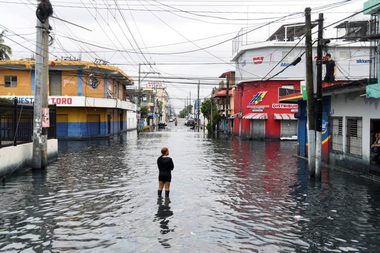 Flooded street in Jamaica caused by Tropical Storm or Hurricane Melissa, showing significant urban flooding and storm impact