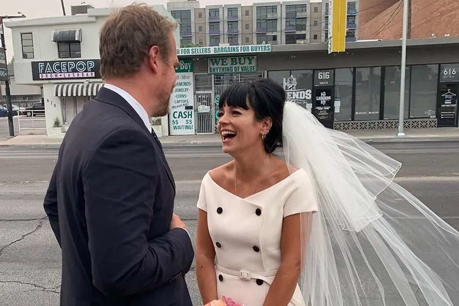 Lily Allen and David Harbour dressed in wedding attire, symbolizing their marriage celebration
