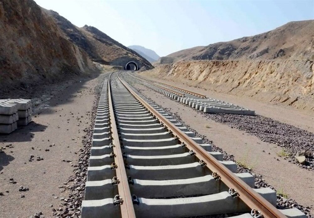 Under-construction railway track near a tunnel in a mountainous region part of the Zahedan-Chabahar route