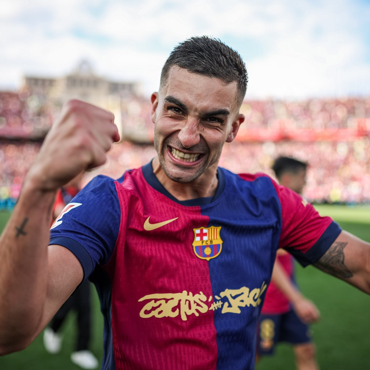 Ferran Torres celebrating a goal wearing the FC Barcelona football jersey during a match.