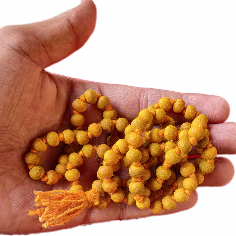 Natural Haldi Mala held in hand