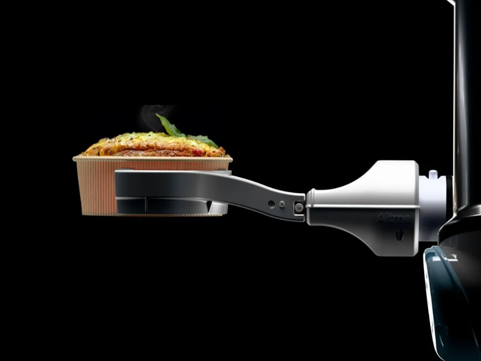 Robotic arm holding a freshly cooked dish, illustrating automated food preparation technology