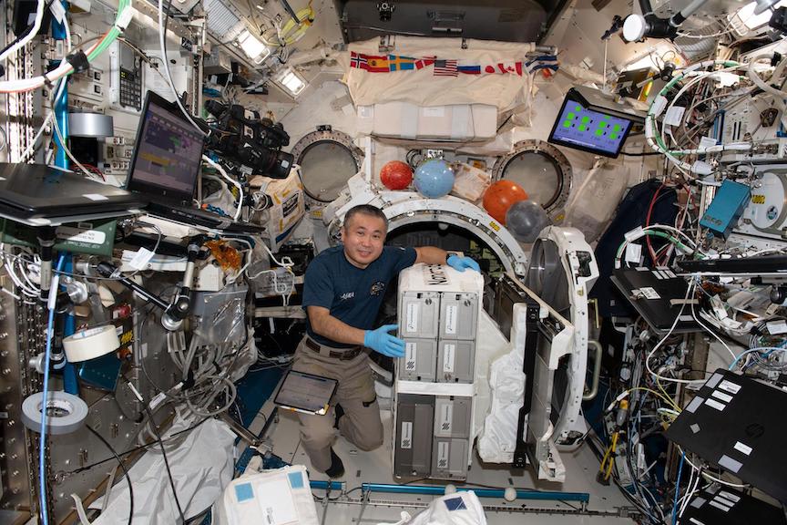 CubeSat deployment from ISS {caption=NanoRacks CubeSat Deployer Installation - SpaceRef}