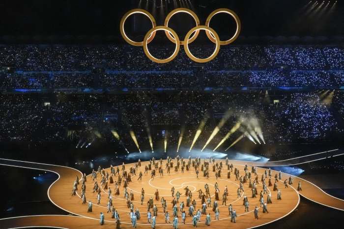 In photos: Winter Olympics 2026 kick off with opening ...